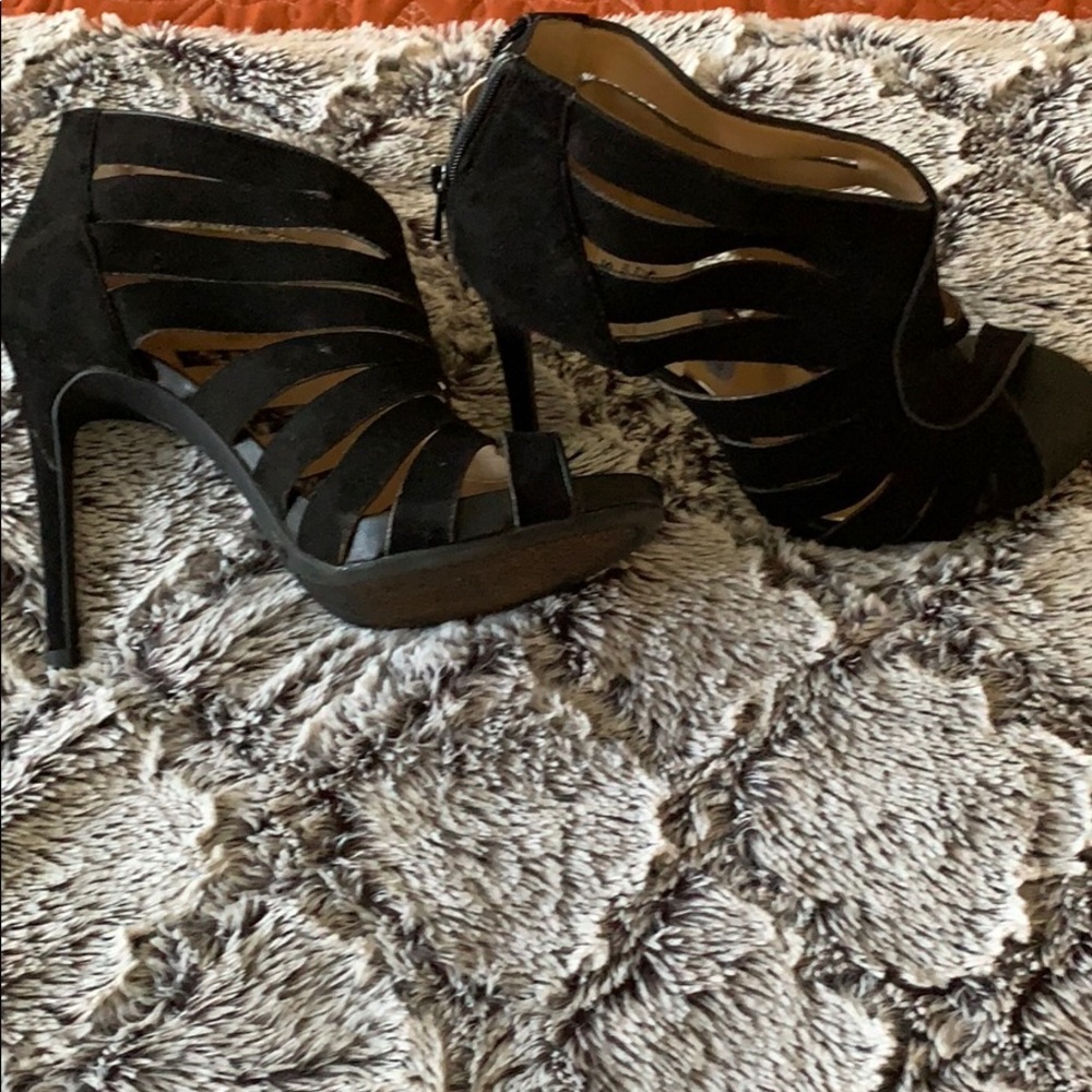 Black high heeled strappy shoes